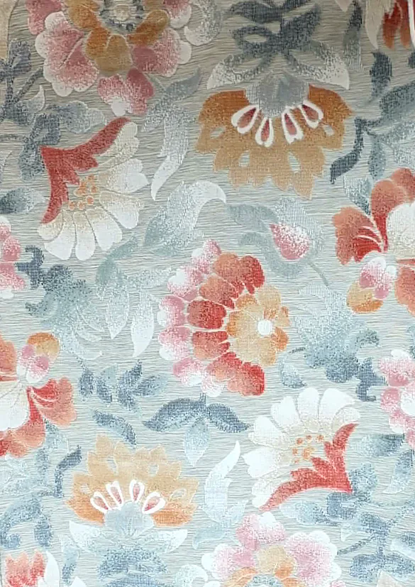 Rug with large coral, rose and peach peonies and pale blue-gray leaves on an ivory ground.